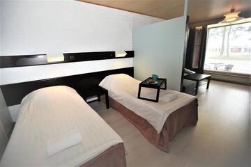 Фото номера Семейный номер с террасой Дома для отпуска Leikari "Nature" Bungalows with Terrace г. Котка 37